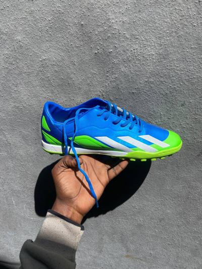 Football shoes,ታኬታ