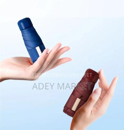 .Mini Uv Resistant Pocket Umbrella