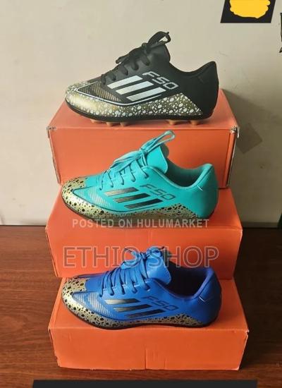Kids Football Shoes,ታኬታ