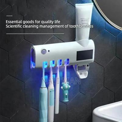 Toothbrush Sterilizer and Dispenser