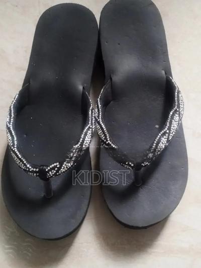 Slippers ለ ውጭ የ ሚሆን