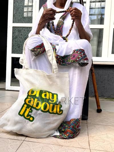 ፀሀይ Aura Bag