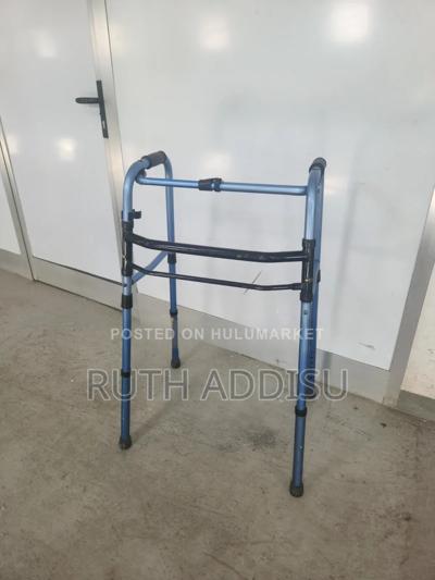 Lightweight Aluminum Walker Features Adjustable Height Settings