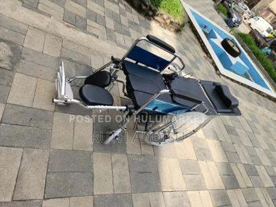 This Is a Multifunctional, Reclining Wheelchair With a Builtn Commode
