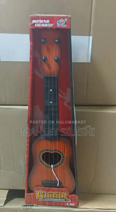 New Classic Toys First Melodies Toy Guitar in Red